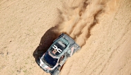 Dacia Sandriders’ Qatari driver Nasser Al-Attiyah and Belgian co-pilot Fabian Lurquin compete in Stage 5 of the 48th Dakar Rally. AFP