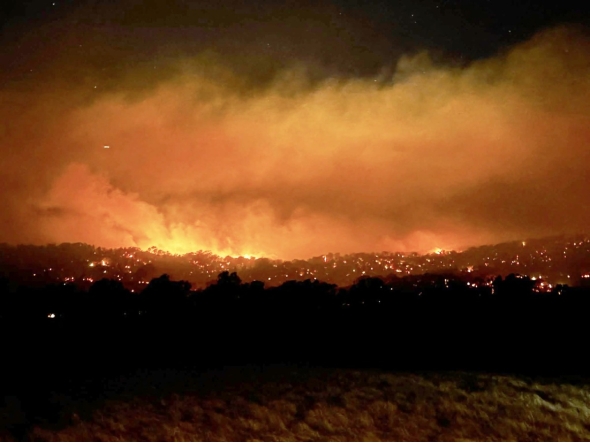 This handout photo from the CFA Wandong Fire Brigade posted on their Facebook page taken on January 7, 2026 and released on January 8 shows a bushfire burning near the town of Longwood, northern Victoria. Photo by KYLIE SHINGLES / CFA WANDONG FIRE BRIGADE / AFP
