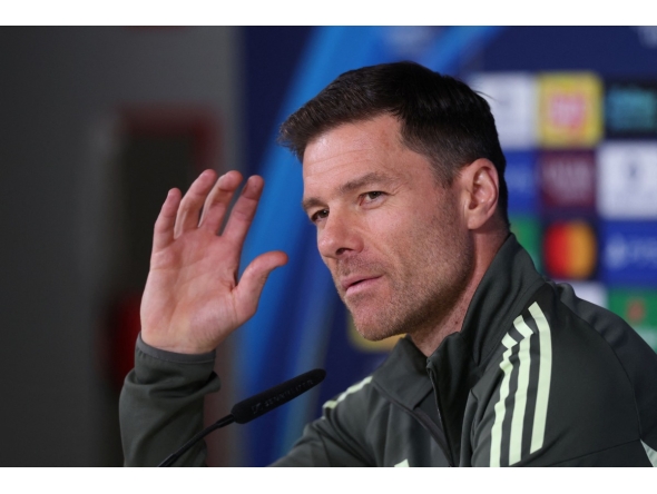 Real Madrid's Spanish coach Xabi Alonso gestures as he gives a press conference at Valdebebas training grounds in Madrid on December 9, 2025 on the eve of their Champions League football match against Manchester City. (Photo by Pierre-Philippe MARCOU / AFP)