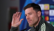 Real Madrid's Spanish coach Xabi Alonso gestures as he gives a press conference at Valdebebas training grounds in Madrid on December 9, 2025 on the eve of their Champions League football match against Manchester City. (Photo by Pierre-Philippe MARCOU / AFP)
