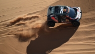 The Dacia Sandriders' Qatari driver Nasser Al Attiyah and Belgian co-driver Fabian Lurquin compete in Stage 8 of the 48th Dakar Rally. AFP