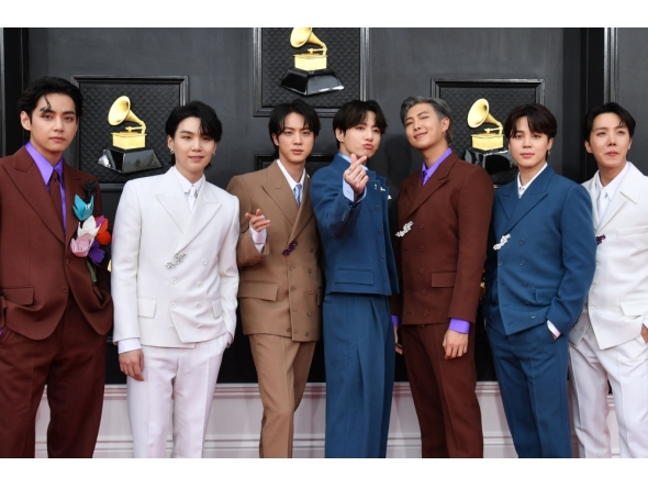 (Files) South Korean boy band BTS arrives for the 64th Annual Grammy Awards at the MGM Grand Garden Arena in Las Vegas on April 3, 2022. (Photo by Angela Weiss / AFP)
 