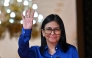 Venezuela's interim President Delcy Rodriguez waves after a press conference at the Presidential Palace in Caracas on January 14, 2026. (Photo by Juan BARRETO / AFP)
