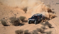 Qatar's Nasser Al Attiyah and Belgian navigator Fabian Lurquin compete in Stage 11 of the Dakar Rally.