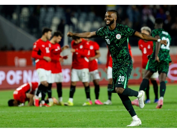 Nigeria's defender #20 Chidozie Awaziem celebrates after the penalty shoot out in the Africa Cup of Nations (CAN) third place football match between Egypt and Nigeria at the Mohammed V Stadium in Casablanca on January 17, 2026. (Photo by Abdel Majid BZIOUAT / AFP)