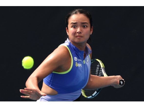 Philippines’ Alexandra Eala hits a return to USA’s Alycia Parks during their women’s singles match against on day two of the Australian Open tennis tournament in Melbourne on January 19, 2026. (Photo by David Gray / AFP) 