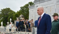 Russia's Interior Minister Vladimir Alexandrovich Kolokoltsev (R) paying tribute to Soviet internationalist soldiers by laying a floral offering at the mausoleum dedicated to these fighters as part of his visit agenda to Cuba, in Havana on January 20, 2026. (Photo by Omara GARCIA MEDEROS / ACN / AFP)