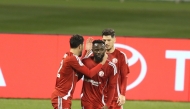 Al Shamal players celebrate a goal against Al Kharaitiyat yesterday. 