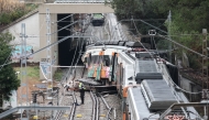 A picture taken on January 21, 2026 shows a regional service train the morning after it collided with a collapsed wall, killing one person and injuring seriously five, between Sant Sadurni d'Anoia and Gelida, near Barcelona.