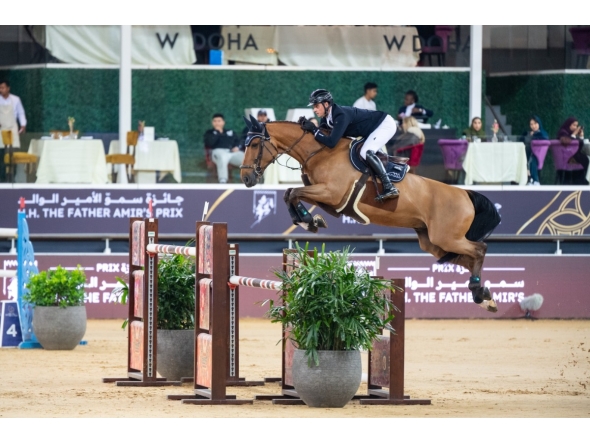 Germany's Christopher Klasener onboard Popeye Vd Bisschop clears a rail in the CSI5* 155cm jump-Off during the the third round of the HH The Father Amir's Prix at Al Shaqab.