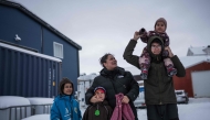 Lykke Lynge and her kids are photographed in Nuuk, Greenland, on January 19, 2026. (Photo by Jonathan Nackstrand / AFP)