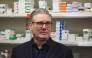 Britain's Prime Minister Keir Starmer pays a visit to a pharmacy at the Nelson Medical Practice health centre in Wimbledon, southwest London on January 26, 2026. (Photo by Adrian Dennis / Pool / AFP)