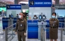 File photo. Immigration police officers are seen during a readiness inspection in preparation for the country's reopening on November 1, at Suvarnabhumi International Airport in Bangkok, Thailand, October 20, 2021. REUTERS/Athit Perawongmetha
