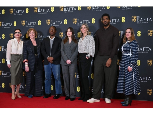 (L-R) BAFTA CEO Jane Millichip, Chair of BAFTA, Sara Putt, British actor David Jonsson, British actor Aimee Lou Wood, Chair of the Film Committee, Emily Stillman, Deputy Chair of the Film Committee, Anthony Andrews and Executive Director of Awards and Content, Emma Baehr pose for a picture at the announcement of the British Academy Film Awards (BAFTA) nominations in central London on January 27, 2026. (Photo by JUSTIN TALLIS / AFP)