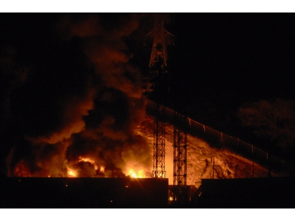 (Files) Picture of fire at Fuerte Tiuna, Venezuela's largest military complex, after a series of explosions in Caracas on January 3, 2026. (Photo by Luis Jaimes / AFP)