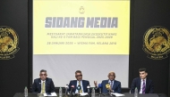 Asian football confederation (AFC) general secretary Windsor John (2nd R) talks as his deputy Vahid Kardany (R), Malaysian football association's (FAM) acting president Yusoff Mahadi (2nd L) and FAM's secretary general Noor Azman Rahman (L) listen during a press conference at the FAM's headquarters in Kuala Lumpur on January 28, 2026. (Photo by Mohd Rasfan / AFP)