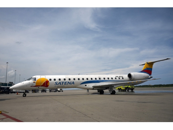 (FILES) A Satena Airlines aircraft covering the route Bogota-Caracas is pictured upon arrival at Simon Bolivar International Airport in Maiquetia, La Guaira State, Venezuela, on November 9, 2022. (Photo by Federico PARRA / AFP)