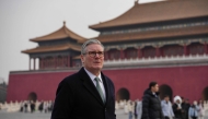 Britain's Prime Minister Keir Starmer visits the Forbidden City in Beijing on January 29, 2026. (Photo by Kin Cheung / AFP)