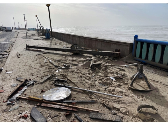 Debris and sand are pictured on a pavement along the coast in Praia da Vieira, after storm Kristin hit Portugal, on January 29, 2026. Photo by Jerome Pin / AFP