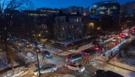 Cars remain in a near standstill as traffic gridlocks in the Dupont Circle neighborhood on January 29, 2026 in Washington, DC. (Photo by Tom Brenner/Getty Images/AFP)