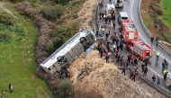 This handout photograph taken and released on February 1, 2026 by Turkish news agency DHA (Demiroren News Agency) shows an aerial view of a Bus accident where first aid official work in Antalya. Photo by Handout / DHA (Demiroren News Agency) / AFP
