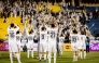 Al Sadd players acknowledge their fans after a win over Al Gharafa.