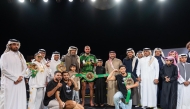 Qatar Boxing and Wrestling Federation President Sheikh Fahad bin Khalid Al Thani with Venum Fight 3 bout winners and officials. 