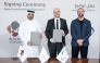 Chief Executive Officer of Alawalia Abdulaziz Ibrahim Al-Tamimi, Regional General Manager at Google Cloud Ghassan Kosta, and General Manager of QDS Mohammad Alam during the signing ceremony.  