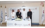 Minister of Transport H E Sheikh Mohammed bin Abdullah bin Mohammed Al-Thani (second right) and other officials at the MoU signing ceremony. 
