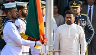Sri Lanka's President Anura Kumara Dissanayake (front, R) arrives to hoist the national flag during the country's 78th Independence Day celebrations at Independence Square in Colombo on February 4, 2026. (Photo by Ishara S. KODIKARA / AFP)