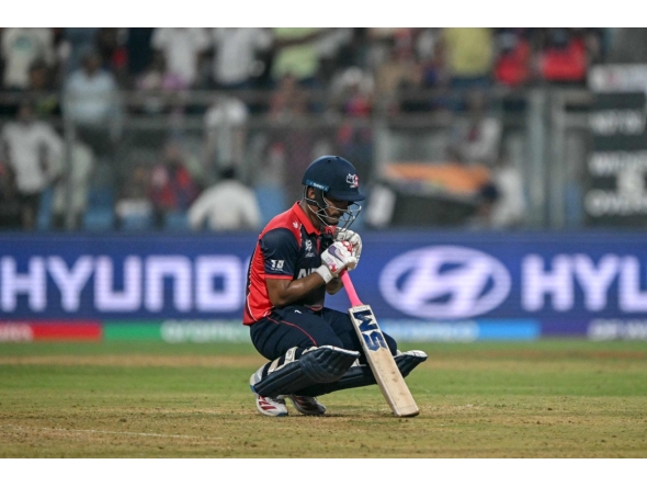 Nepal's Lokesh Bam reacts after his team's defeat at the end of the 2026 ICC Men's T20 Cricket World Cup group stage match between England and Nepal at the Wankhede Stadium in Mumbai on February 8, 2026. (Photo by Indranil MUKHERJEE / AFP)
