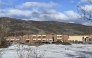 This screengrab of a video provided by local journalist Trent Ernst shows the middle school and high school building where a shooting took place, leaving at least nine people dead in the small town of Tumbler Ridge, British Columbia, on February 10, 2026. (Photo by Trent Ernst / AFP)
