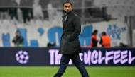 (FILES) Olympique de Marseille's French-Moroccan sporting director Medhi Benatia walks on the pitch at the end of the UEFA Champions League, league phase day 4, football match between Olympique de Marseille (OM) and Atalanta Bergame at the Velodrome stadium, in Marseille on November 5, 2025. (Photo by Christophe Simon / AFP)