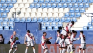 Rayo Vallecano's Spanish midfielder #21 Fran Perez (C) celebrates scoring his team's first goal with teammates during the Spanish league football match between Rayo Vallecano de Madrid and Club Atletico de Madrid at Butarque Stadium in Leganes, south of Madrid on February 15, 2026. (Photo by Pierre-Philippe MARCOU / AFP)