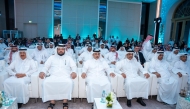 Minister of Environment and Climate Change H E Dr. Abdullah bin Abdulaziz bin Turki Al Subaie with officials and participants during the symposium.