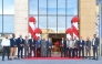 Vodafone Qatar officials during the opening of a new store. 