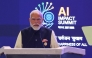 India's Prime Minister Narendra Modi delivers a speech at the AI Impact Summit in New Delhi on February 19, 2026. (Photo by Ludovic Marin / AFP)
