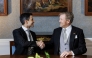 Netherlands' King Willem-Alexander (R) shakes hands with Prime Minister Rob Jetten during the signing of the Royal Decrees in the Meeting Room at Huis ten Bosch Palace for the swearing-in ceremony of the new cabinet in The Hague, The Netherlands on February 23, 2026. (Photo by Koen van Weel / ANP / AFP)
