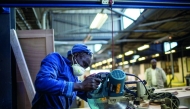 A worker cuts wood at the Furntech Workshop in Johannesburg, South Africa. Representational file photo.