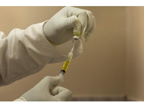 A clinician fills a syringe a dose of the long-acting injectable HIV pre-exposure prophylaxis (PrEP), Lenacapavir injection before administering to a client, during its launch marking the first phase of the national rollout at the Riruta Health Centre in Nairobi on February 26, 2026. (Photo by Simon Maina / AFP)