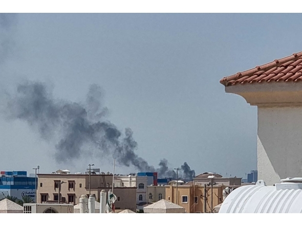 A smoke plume rises over Abu Dhabi from the site of an Iranian missile strike on February 28, 2026. (Photo by AFP)