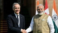 India's Prime Minister Narendra Modi (R) shakes hands with his Canadian counterpart Mark Carney before their meeting at the Hyderabad House in New Delhi on March 2, 2026. (Photo by Sajjad Hussain / AFP)