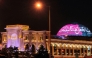 A prayer appealing to Allah for protection is projected on the dome of al-Hazm shopping mall in Doha on March 1, 2026. Photo by Karim Jaafar / AFP
