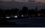 A view of buildings during a blackout in Havana taken on March 4, 2026. (Photo by Yamil Lage / AFP)