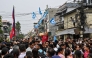 Supporters of the Rastriya Swatantra Party (RSP) celebrate outside the counting centre at Damak in Jhapa district on March 7, 2026. (Photo by Prakash Mathema / AFP)