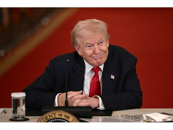 US President Donald Trump listens during a roundtable in the East Room of the White House in Washington, DC, on March 6, 2026. (Photo by Brendan Smialowski / AFP)