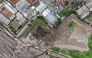 This aerial picture shows a rescue team using heavy machinery to search for people following a landslide at Bantargebang landfill in Bekasi, West Java, on March 9, 2026 (Photo by Bay Ismoyo / AFP)