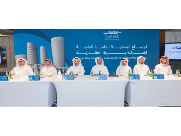 Chairman of the Board H E Abdullah bin Hamad bin Abdullah Al Attiyah with other officials during the Ordinary General Assembly meeting.