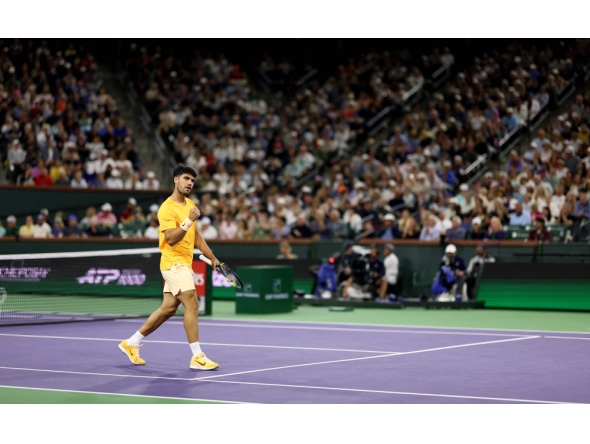 Carlos Alcaraz of Spain celebrates a point against Arthur Rinderknech of France in their third-round match of the BNP Paribas Open at Indian Wells Tennis Garden on March 09, 2026 in Indian Wells, California. Photo by Clive Brunskill/ AFP)