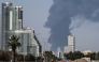 Smoke rises from the direction of an energy installation in the Gulf emirate of Fujairah on March 14, 2026. (Photo by AFP) 